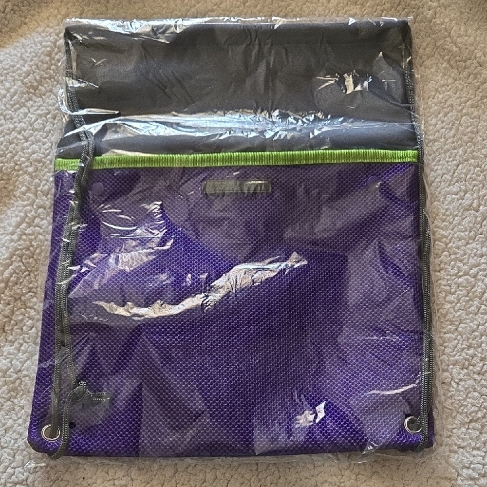 Rodan + Fields Purple and Green Mesh Bag